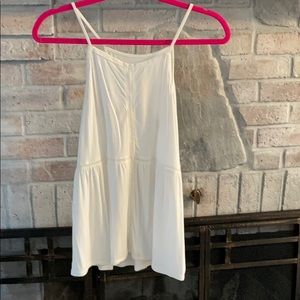 high-neck peplum AE top with eyelet detail